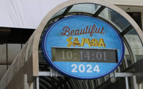 A sign on the Samoa government building in Apia shows the countdown to CHOGM.