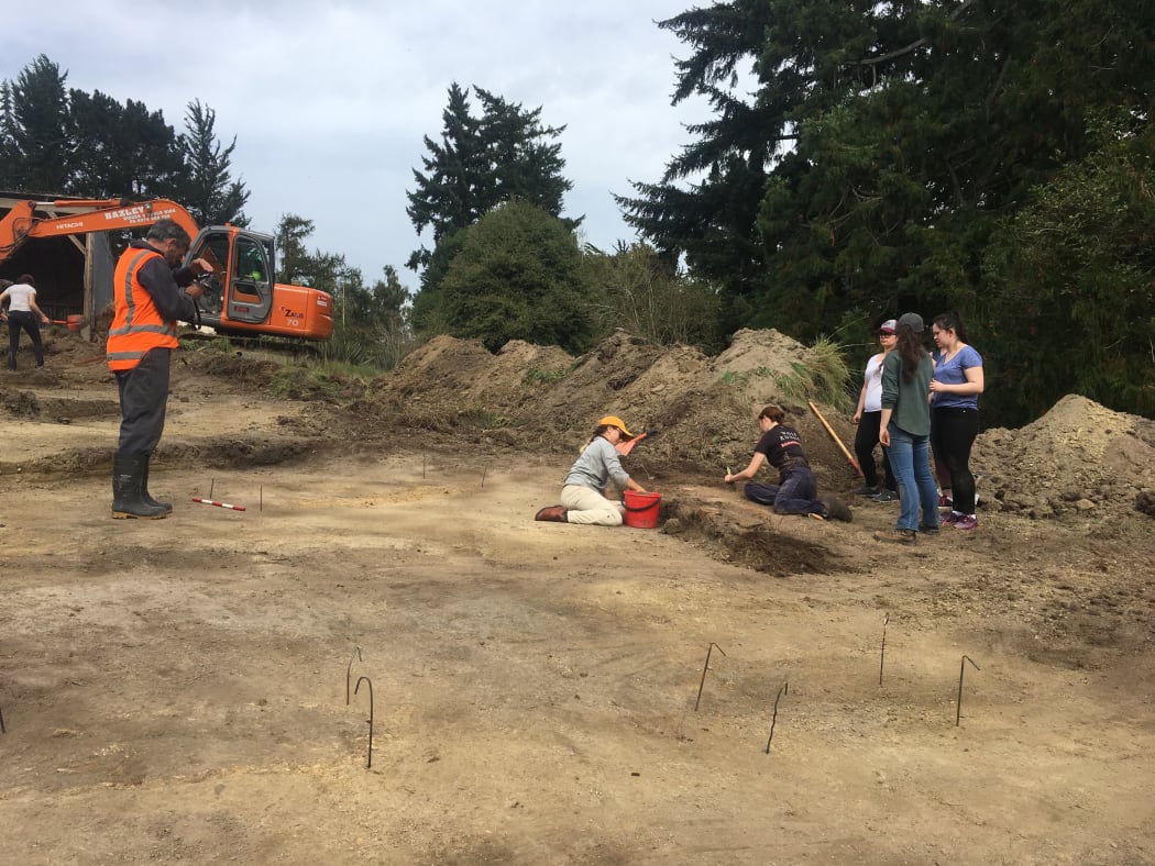 Researchers at Lawrence cemetery