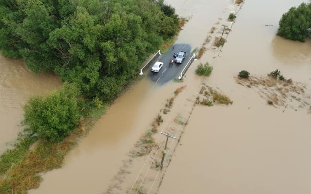 Motorists find a dry refuge in the Waikaka area on Tuesday.