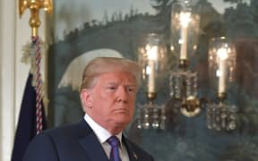 US President Donald Trump arrives to address the nation on the situation in Syria April 13, 2018 at the White House in Washington, DC.