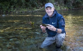 Dr John Hayes of Cawthron Institute in a river