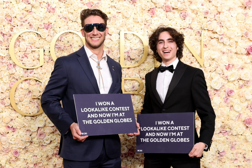 BEVERLY HILLS, CALIFORNIA - JANUARY 05: (L-R) Max Braunstein and Miles Mitchell attend the 82nd Annual Golden Globe Awards at The Beverly Hilton on January 05, 2025 in Beverly Hills, California.