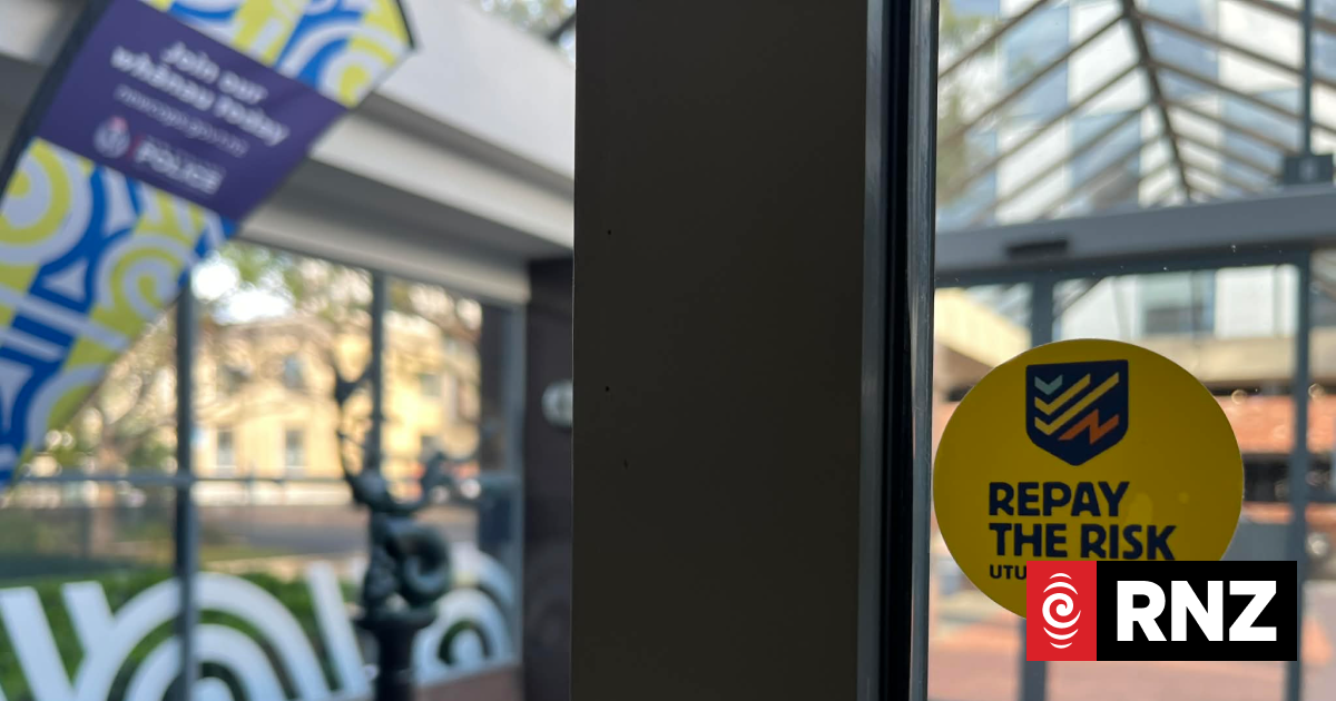 Police defy district's top cop by posting pay protest stickers in station