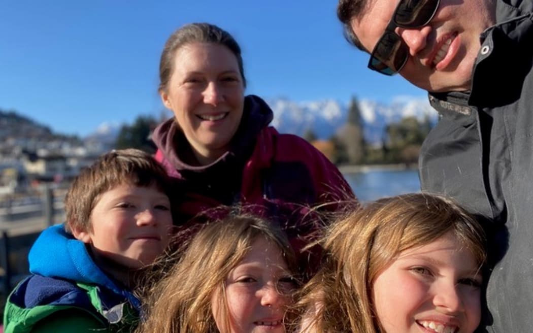 Sarah Hartley, Rob McIntosh and their children, twins Iona and Abigail, 8, and Alex,10.