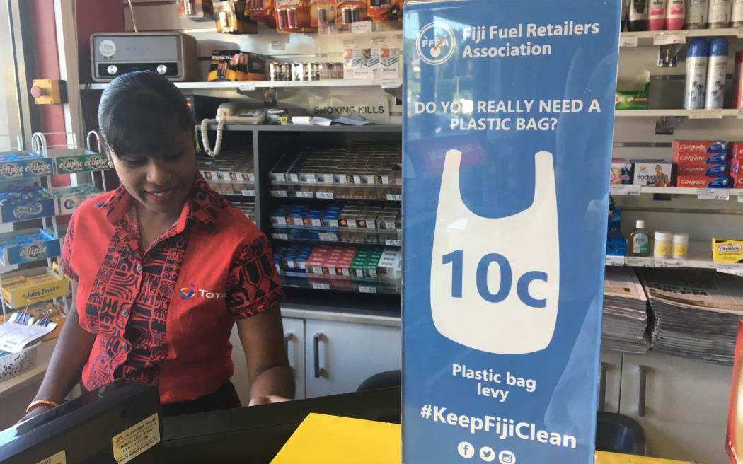 A sign at a petrol station in Fiji discouraging plastic bag use