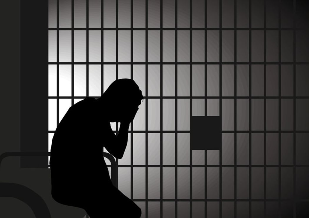 Sad person in jail