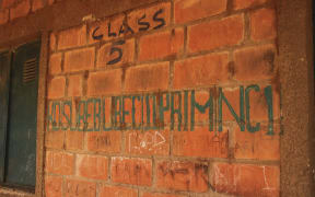 A general view of writing on a wall outside a classroom at Kuriga school in Kuririga on March 8, 2024, where more than 250 pupils kidnapped by gunmen. Nigeria's President Bola Ahmed Tinubu on March 8, 2024 sent troops to rescue more than 250 pupils kidnapped by gunmen from a school in the country's northwest in one of the largest mass abductions in three years.
The Kaduna state attack was the second mass kidnapping in a week in Africa's most populous state, where heavily armed criminal gangs on motorbikes target victims in villages and schools and along highways in the hunt for ransom payments.
Local government officials in Kaduna State confirmed the kidnapping attack on Kuriga school on March 7, 2024, but they have still not given figures as they said they were still working out how many children had been abducted. (Photo by Haidar Umar / AFP)