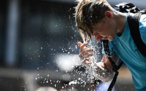 A man enjoys a hot summer day in Muzeon Art Park in Moscow, Russia.