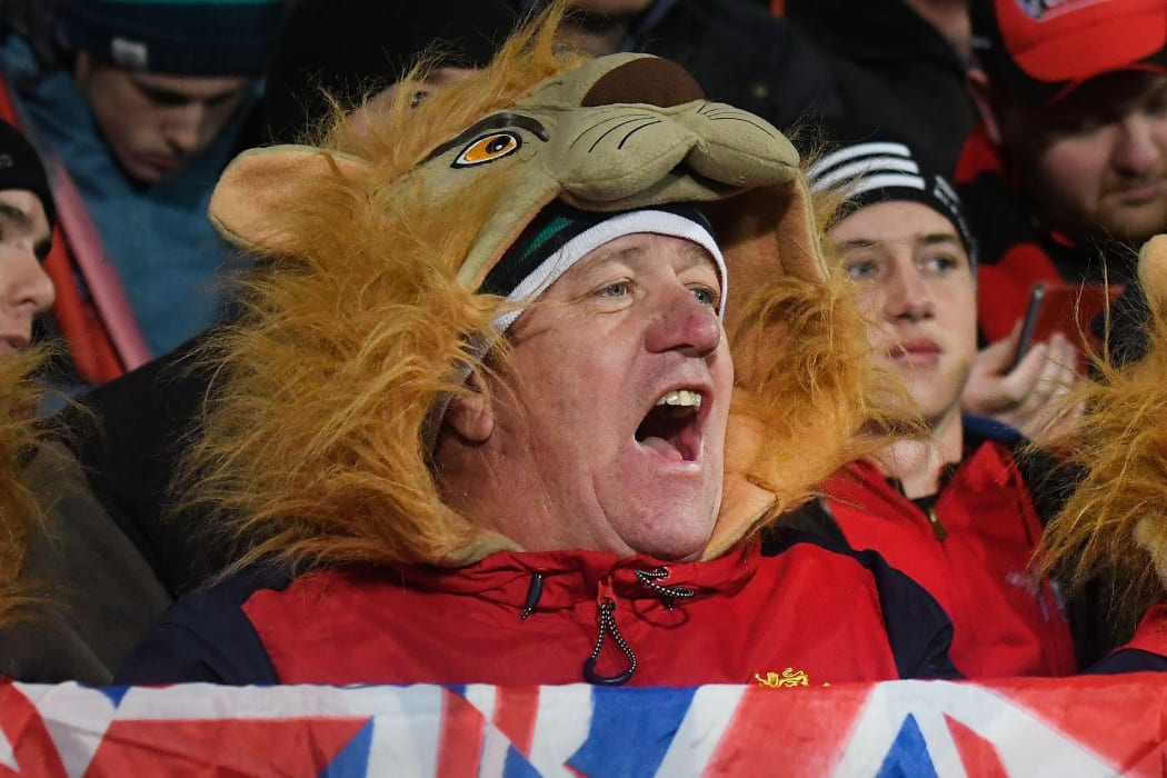 Lions fans celebrate their win during the rugby union match between the Crusaders and the British and Irish Lions at AMI Stadium in Christchurch on June 10, 2017.