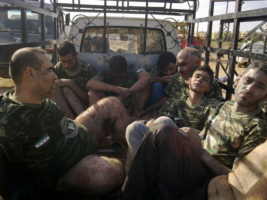Captured Syrian rebel fighters in 2012. Amnesty International alleges that up to 13,000 Syrians, most of them civilians, were executed by the Syrian government between 2011 and 2015.