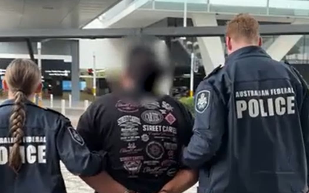 A NZ man has been charged with trying to import $10 million of heroin to Sydney in floral-patterned bags.