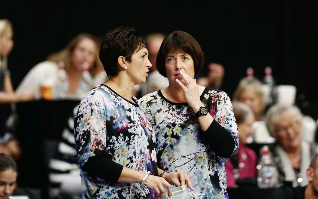 Silver Ferns head coach speaking to assistant coach Yvette McCausland-Durie