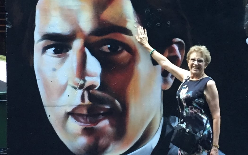 Kaye Shewry in front of mural of her son Ben Shewry in Melbourne
