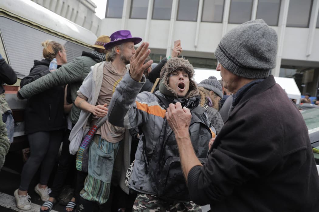 Protesters clashed with police during an early morning police operation at Parliament.