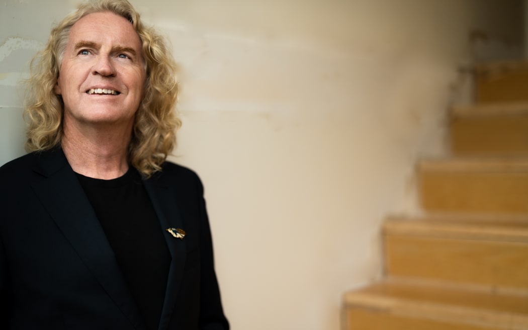 Don McGlashan stood by some stairs.