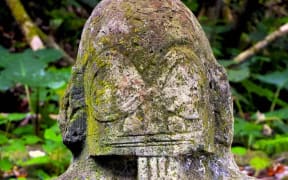 A tiki spirit stone carving on Hiva Oa, Puamau Valley, Marquesas islands – PHOTO UNESCO