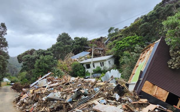 Slips, house damage in Karekare in West Auckland caused by Cyclone Gabrielle