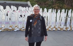 Corinda Taylor from Life Matters delivering a petition to Parliament.