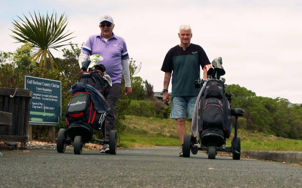 Former club members Len and John on the links.