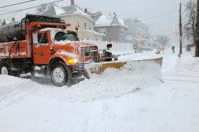 A snow plow in Winthrop Massachusetts.