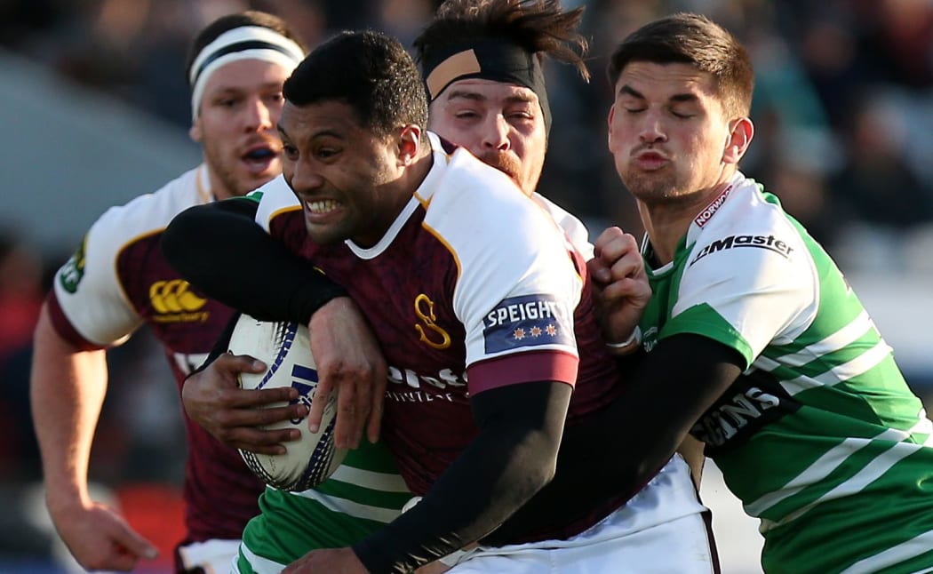 Lima Sopoaga of Southland in the tackle of Otere Black of Manawatu.