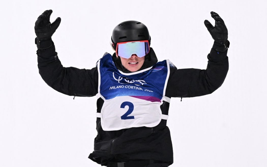 New Zealand's Zoi Sadowski Synnott reacts after competing in the snowboard women's big air final run 2 during the Milano Cortina 2026 Winter Olympic Games at Livigno Snow Park, in Livigno (Valtellina), on 9 February 2026.