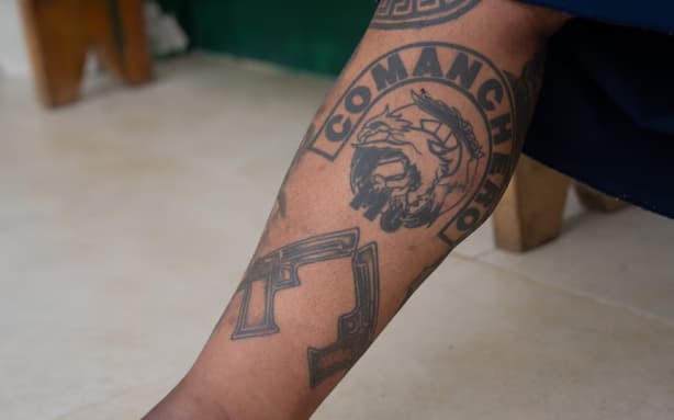 A Comancheros tattoo on Taumoefolau's leg. (Foreign Correspondent: Stephanie March)