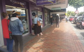 The queue for TSB Bank in New Plymouth this morning.