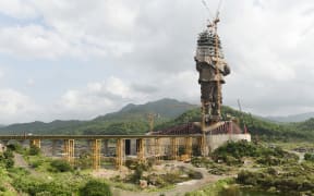 The under-construction "Statue Of Unity", a monument dedicated to Indian independence leader Sardar Vallabhbhai Patel, overlooking the Sardar Sarovar Dam near Vadodara in India's western Gujarat state.