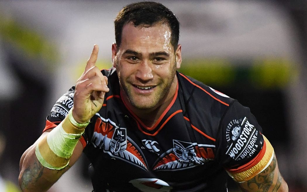 Bodene Thompson celebrates his try.