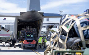 A Hercules C130 H is loaded up with HADR supplies to deliver to Vanuatu after a severe earthquake.