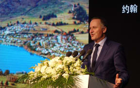 Prime Minister John Key announces Queenstown has successfully won a bid to host Amway's top sales people in 2018. The announcement took place at the Kerry Centre in Shanghai.