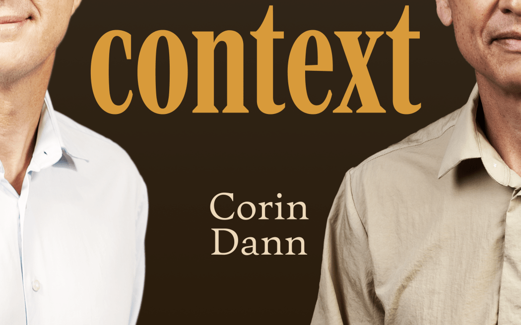 Two men face the camera with serious but open expressions. Text reads "Context, Corin Dann and Guyon Espiner"