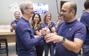 Apple CEO Tim Cook with Apple Store employees