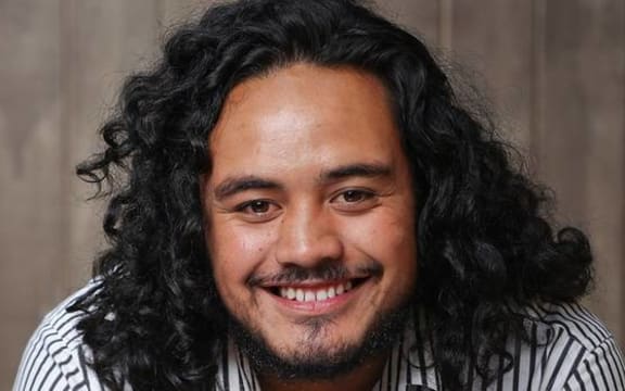Headshot of baritone Samson Setu
