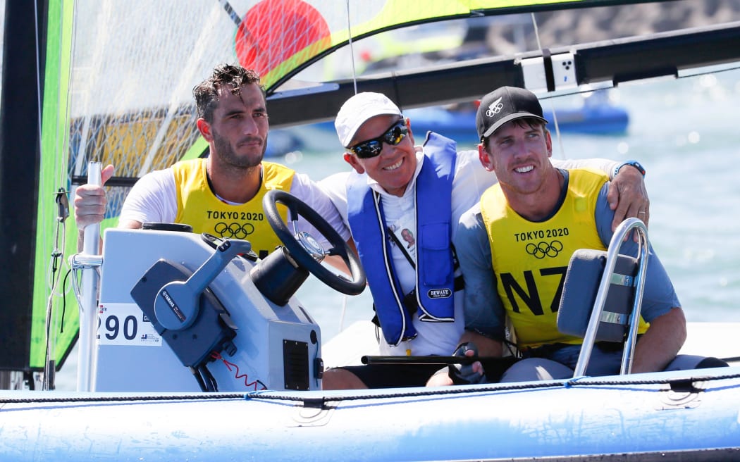 Peter Burling and Blair Tuke  (NZL) 49er men's silver medalists with coach Hamish Willcox.
Tokyo 2020 Olympic Games at Enoshima, Kanagawa, Japan on Tuesday 3rd August 2021.