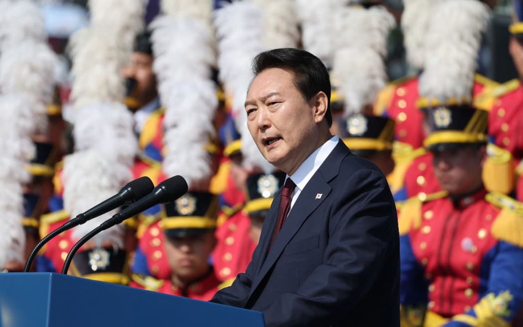 South Korea's President Yoon Suk-yeol delivers a speech during a ceremony marking the 74th anniversary of Armed Forces Day at the Military Base in Gyeryong city on October 1, 2022. (Photo by YONHAP / YONHAP / AFP) / - South Korea OUT / REPUBLIC OF KOREA OUT  NO ARCHIVES  RESTRICTED TO SUBSCRIPTION USE