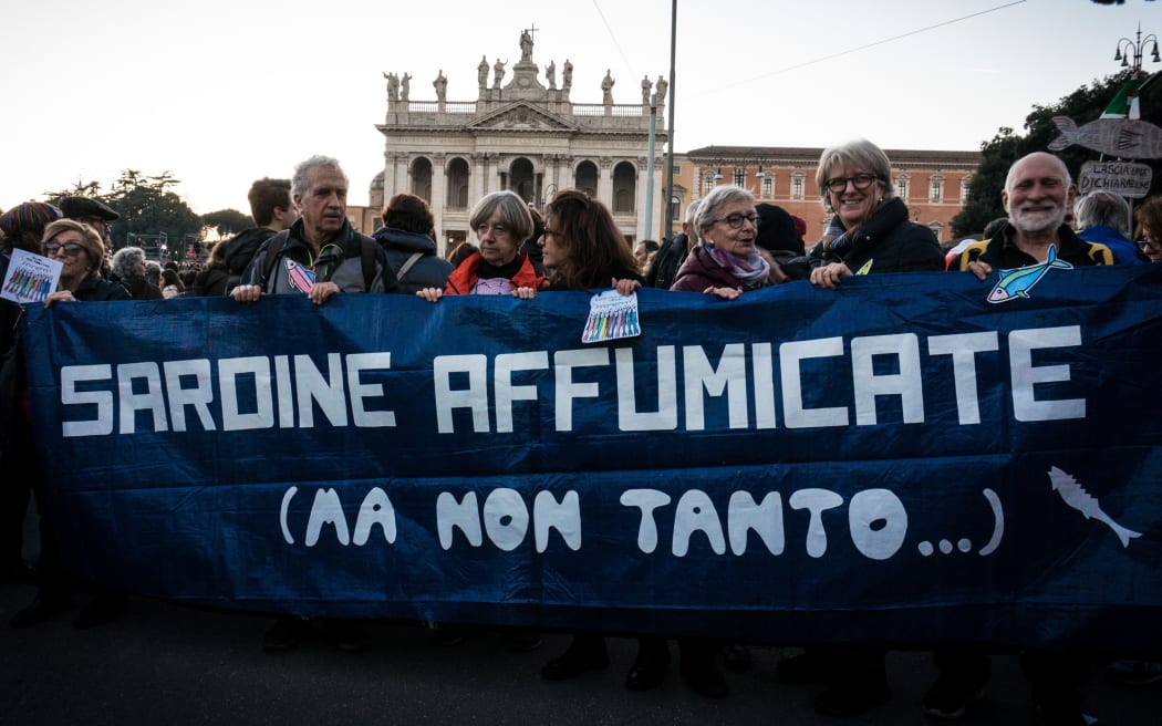 People gather in St. John at the Lateran Square for a demonstration of the Sardines  an Italian grass-roots movement against right-wing populism,  on December 14, 2019 in Rome