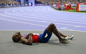 US' Noah Lyles reacts after competing in the men's 200m final of the athletics event at the Paris 2024 Olympic Games at Stade de France in Saint-Denis, north of Paris, on August 8, 2024. (Photo by Jewel SAMAD / AFP)