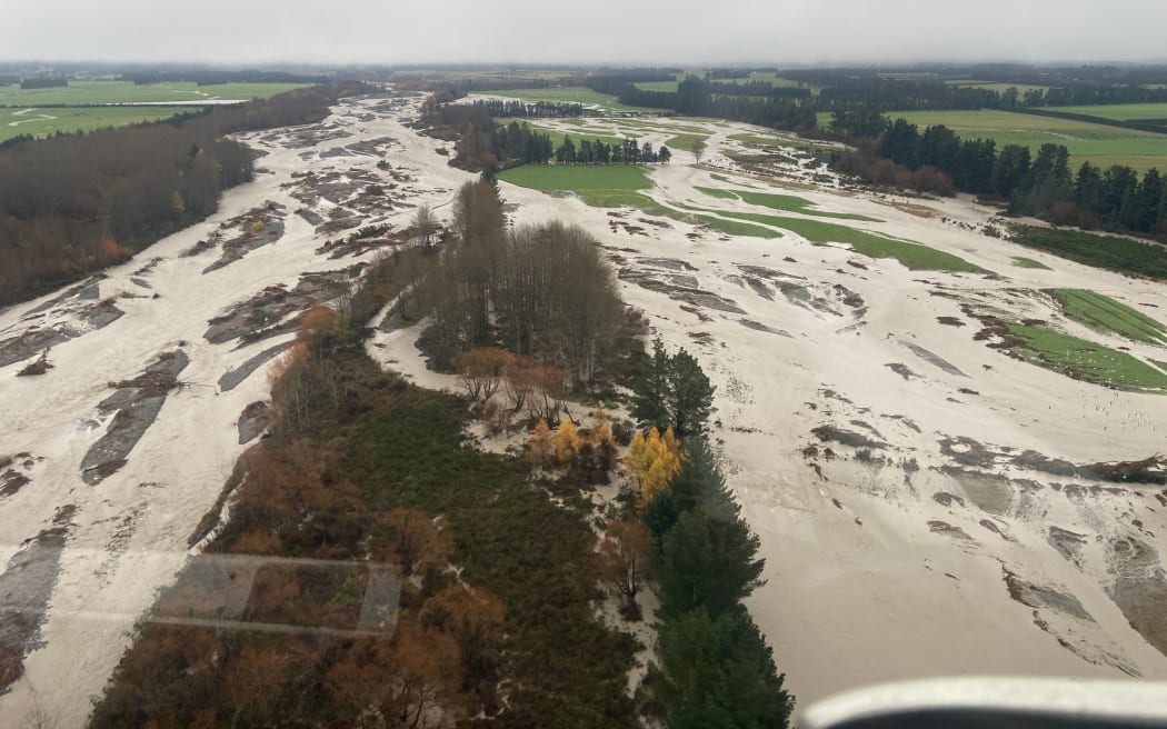Digging trenches for anchored tree protection in the Hakatere/Ashburton River.