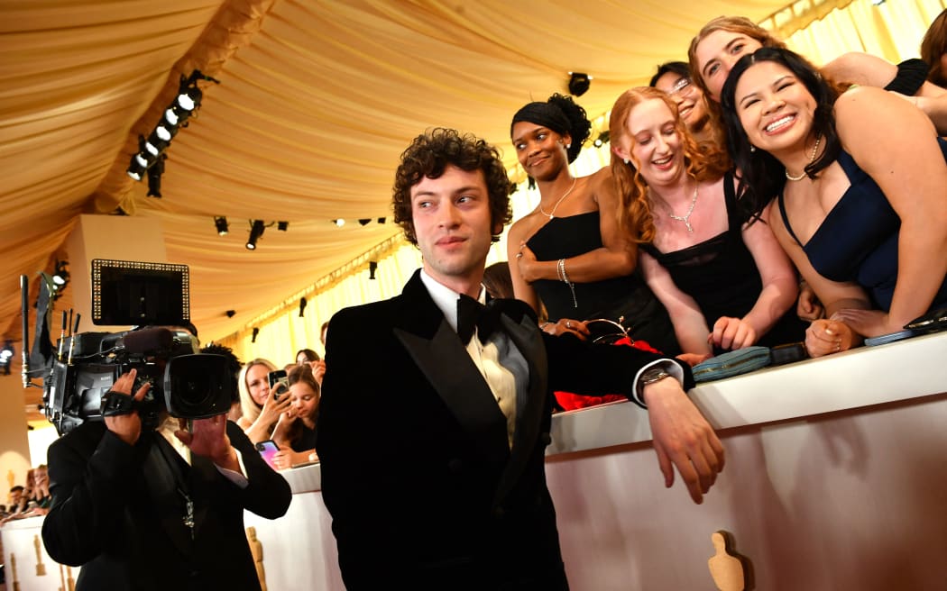 Actor Dominic Sessa poses with guests at the Dolby Theatre in Hollywood, California on March 10, 2024. (Photo by Valerie Macon / AFP)