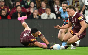 Valentine Holmes (left) of Queensland scores a try during State of Origin 2023 - Game 2, Brisbane.