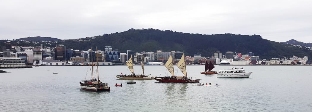 Four voyaging waka in Wellington's Oriental Bay at the opening of the Waka Odyssey