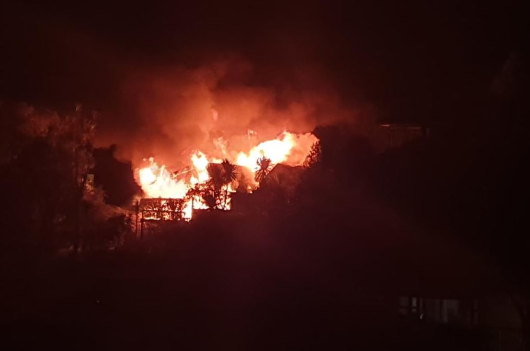 Castor Bay resident Lindsay Mouat took this photograph of a house on Taumatua Road on fire on Friday night.