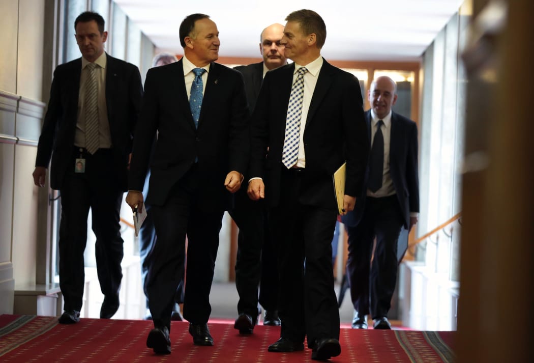 Budget 2014. John Key and Bill English walking towards the debating chamber
