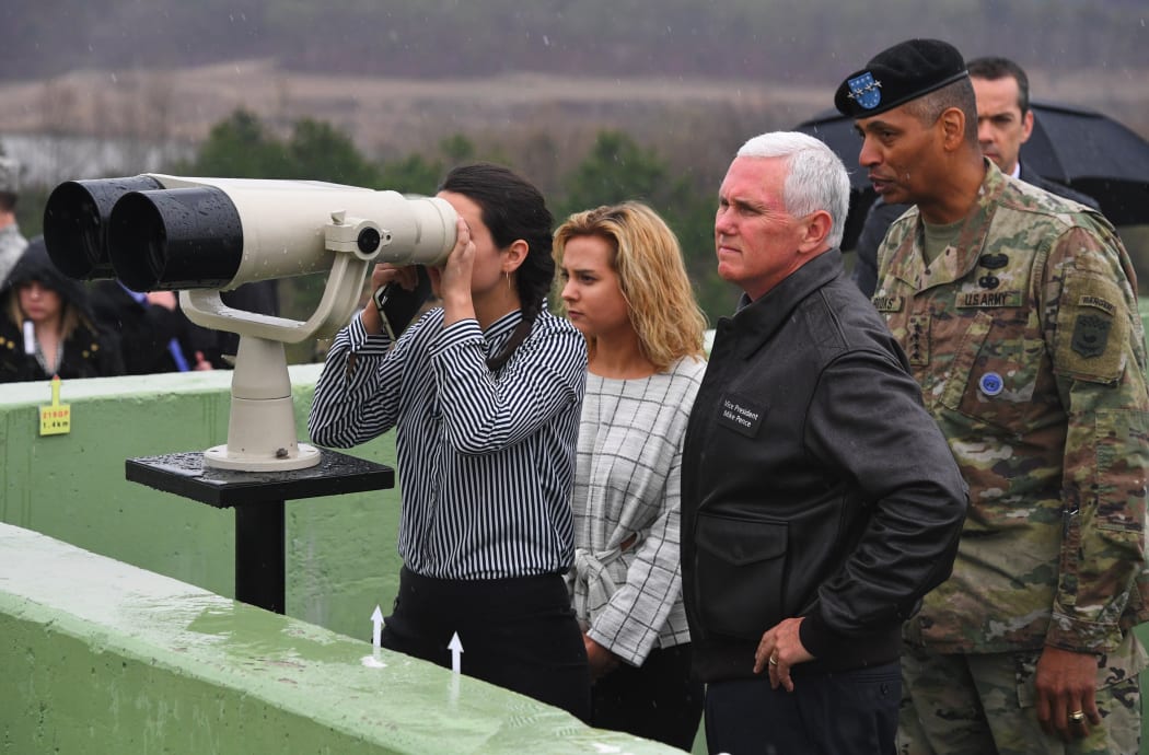 Mike Pence (second right) visits Observation Post Ouellette with his daughters near the truce village of Panmunjom in the Demilitarized Zone.