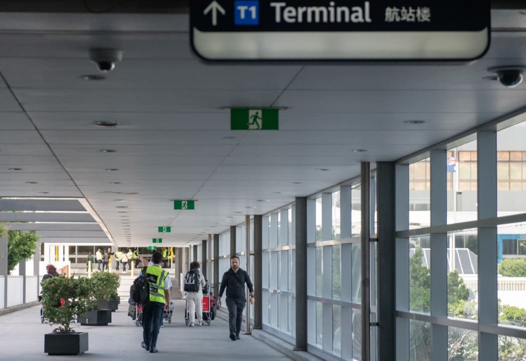 Few passengers are seen on departure at Sydney International Airport on April 11, 2020 in Sydney, Australia as the coronavirus pandemic forced the virtual shutdown of air travel.