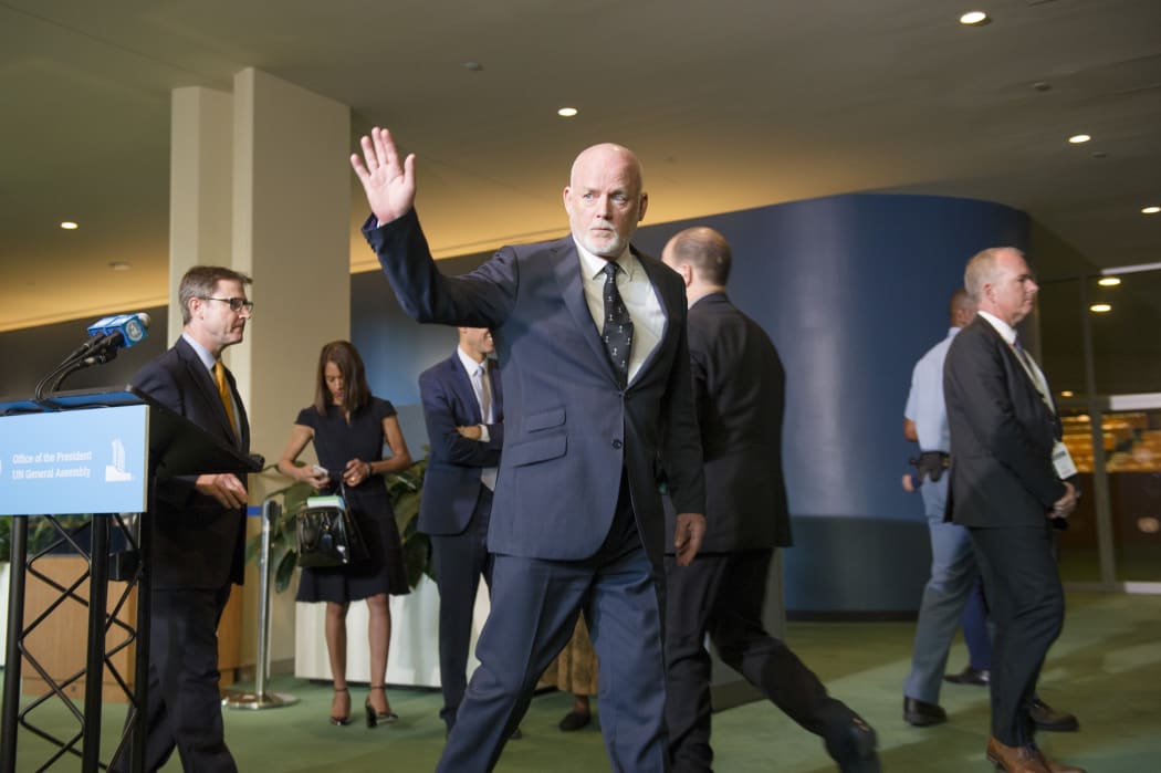 Peter Thomson (centre), President of the seventy-first session of the General Assembly, at the conclusion of his briefing to journalists, which took place following the opening meeting of the Assembly's new session.