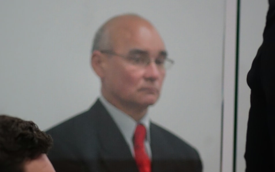 West Auckland resident and former teacher Victor Charles Jacka, 54, third from left, was sentenced today in the Waitakere District Court.