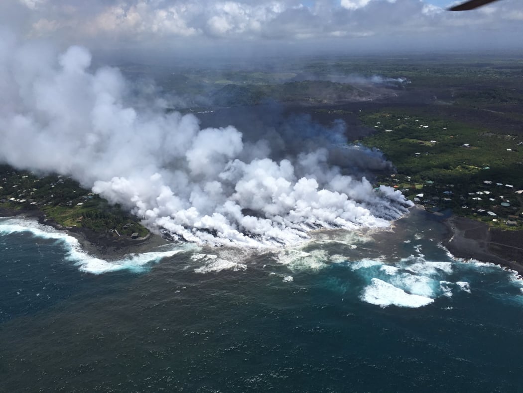 Lava flow from Fissure 8 Kilaua eruption spilling into Kapoho Bay